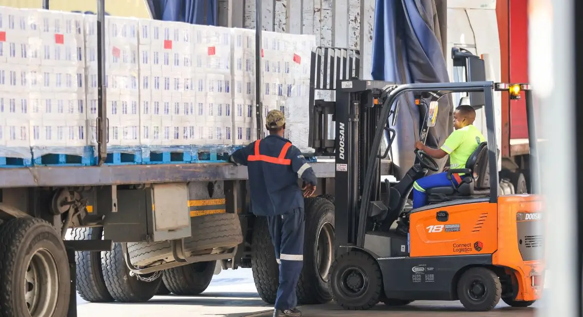 Connect Logistics parked at an industrial loading site indicating the company's logistics and transportation services.