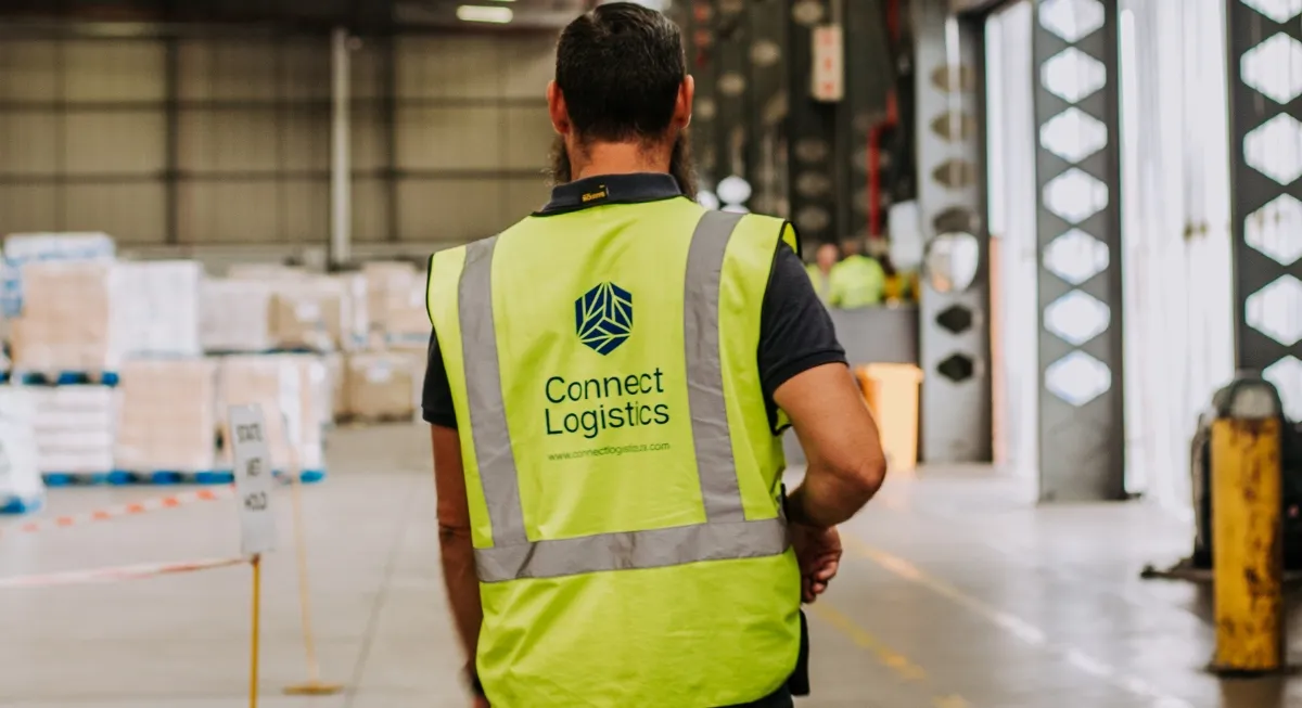 Connect Logistics Truck Connect Logistics parked at an industrial loading site indicating the company's logistics and transportation services.